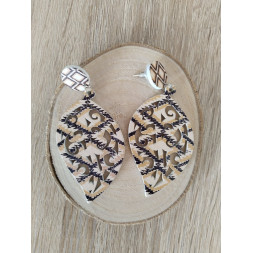 Boucle Arabesque écrue en bois