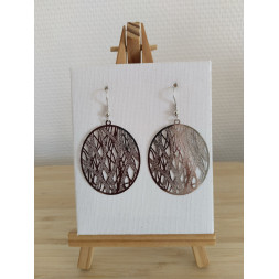 Boucle d’oreille ovale et argentée