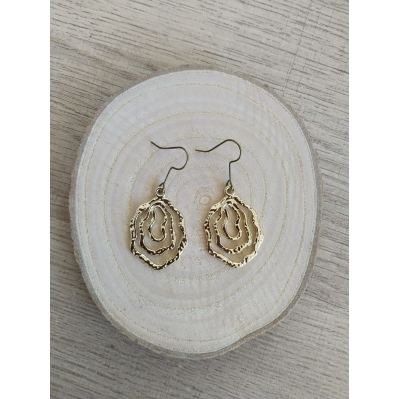 Boucle d’oreille spirale dorée