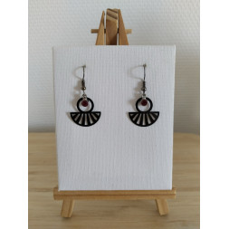 Boucle d’oreille noire soleil levant