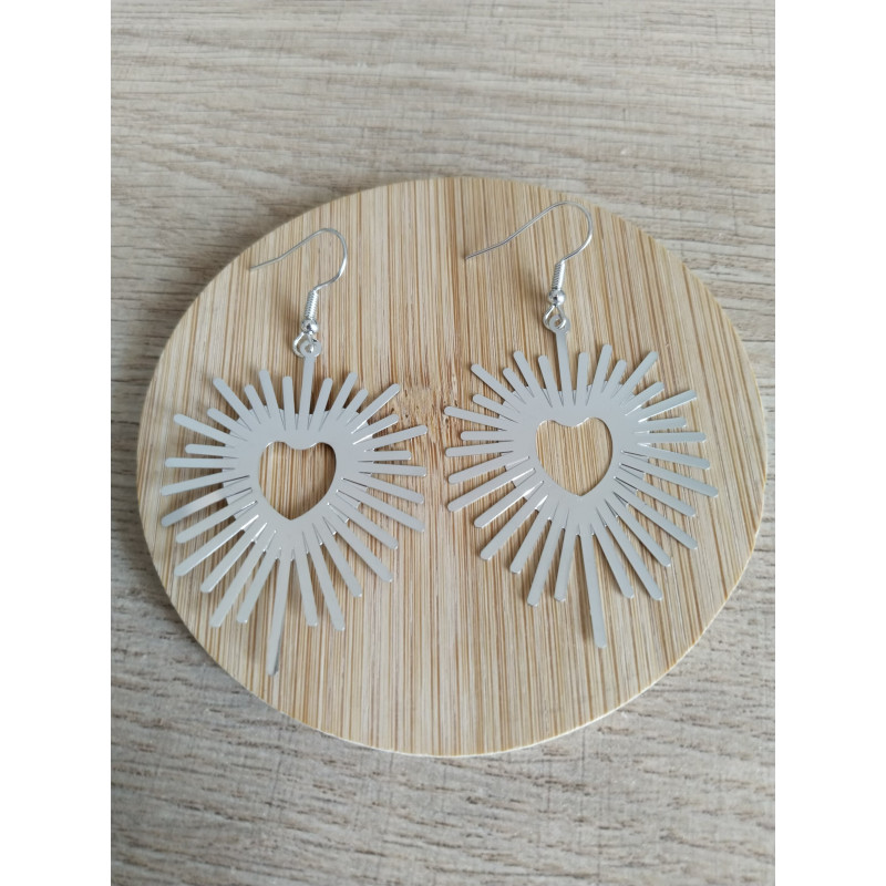 Boucle d’oreille argentée en coeur