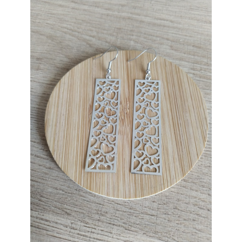 Boucle d’oreille frise en coeurs